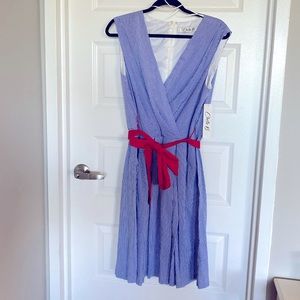 Seersucker boat dress with red tie sash.